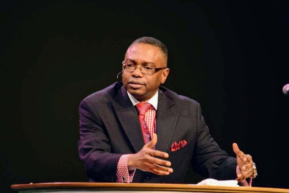 Reggie Holiday preaching at Bethany Fellowship Church.