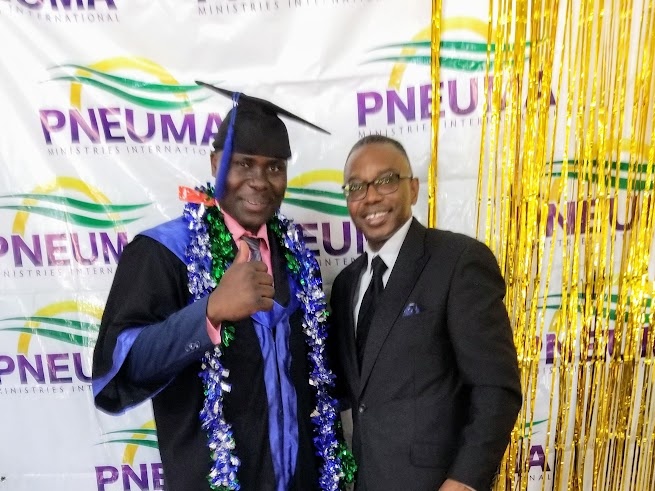 Reggie Holiday with a Pneuma Leadership Institute graduate in Nairobi, Kenya.